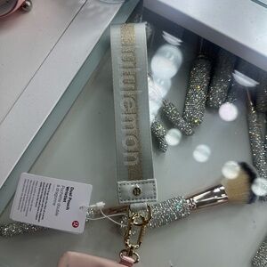 Lululemon Gray and Gold Keychain